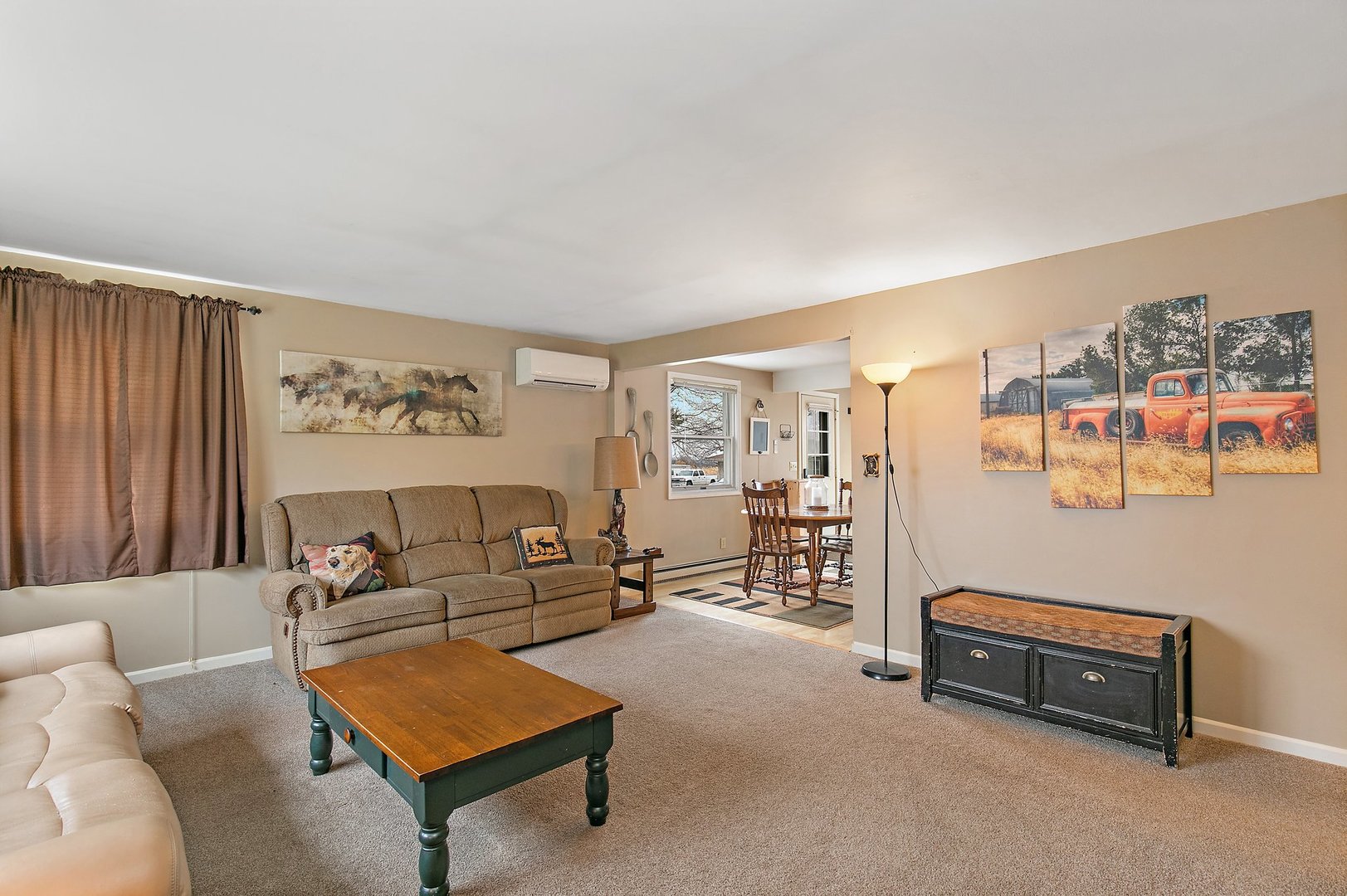 6770 Cherry Valley Road Kingston, IL 60145 - Photo 4 of 15 a living room with furniture and a table