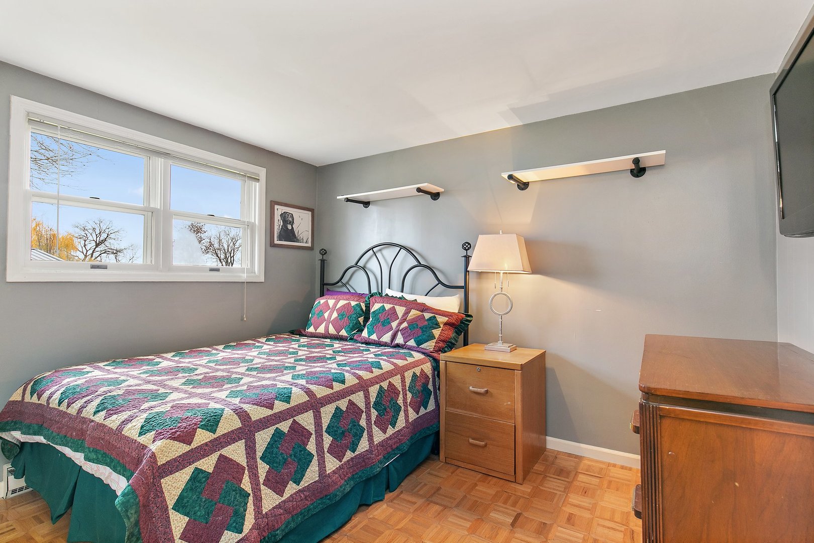 6770 Cherry Valley Road Kingston, IL 60145 - Photo 8 of 15 a bedroom with a bed and a window