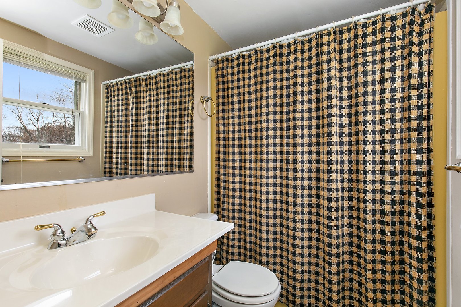 6770 Cherry Valley Road Kingston, IL 60145 - Photo 10 of 15 a bathroom with a sink toilet and shower