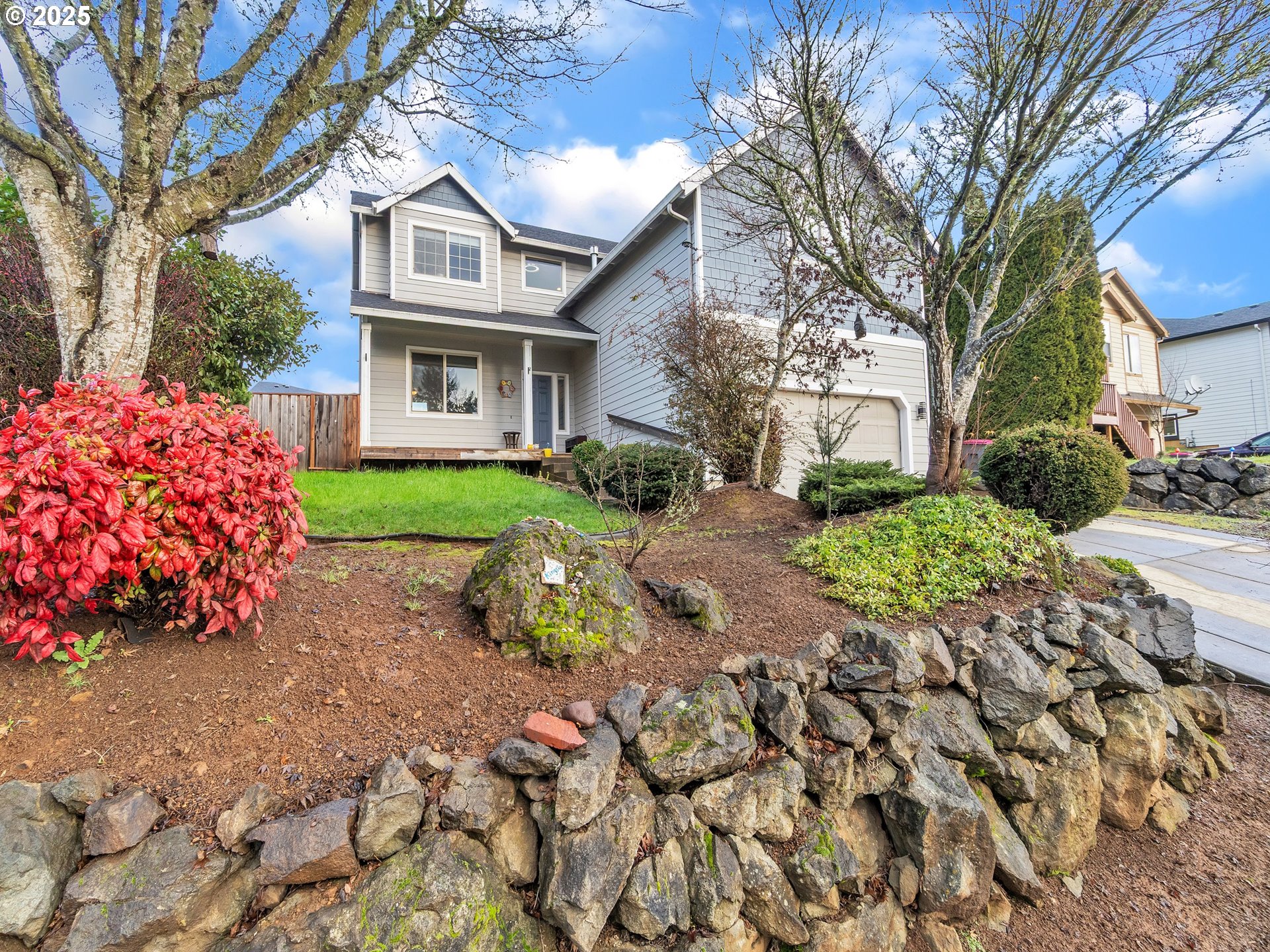 a front view of a house with garden