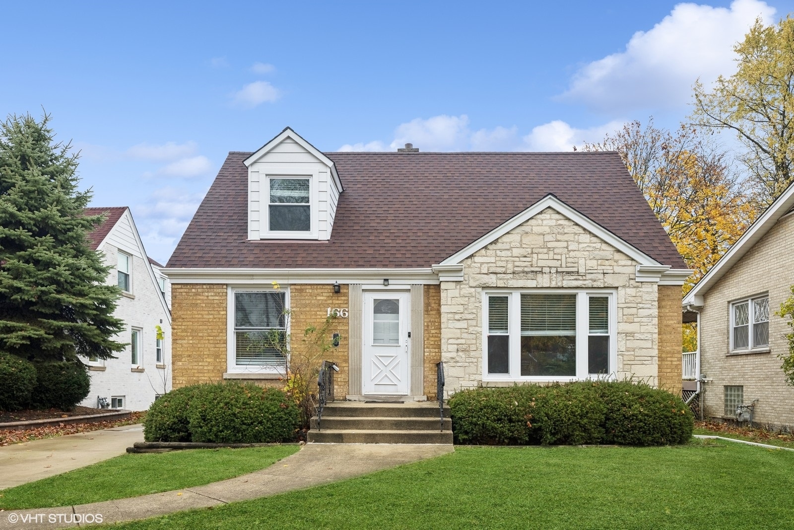 166 Northgate Road Riverside, IL 60546 - Photo 1 of 15 a front view of a house with a yard
