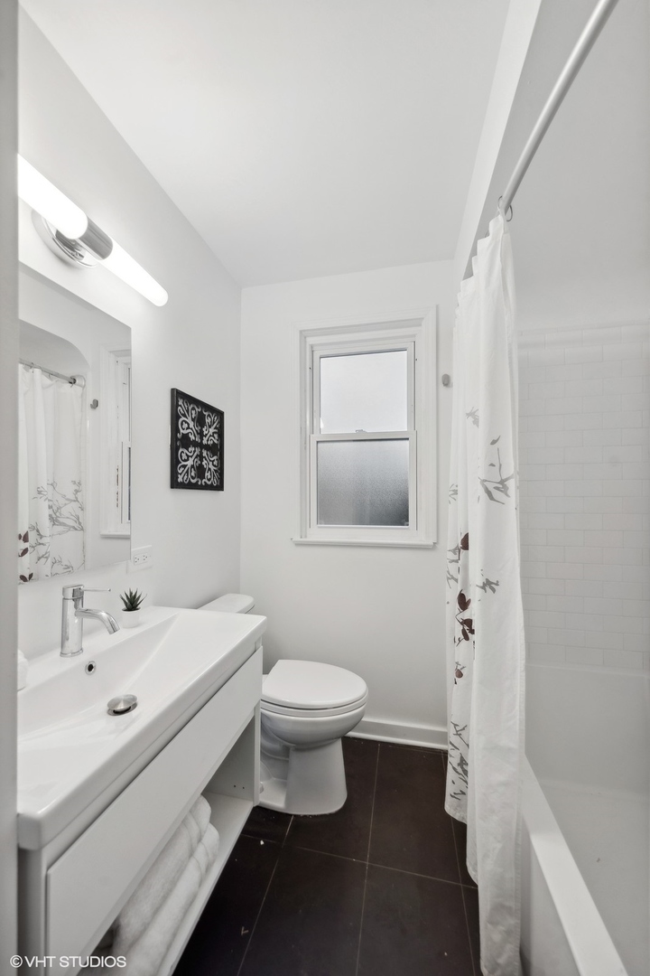 166 Northgate Road Riverside, IL 60546 - Photo 5 of 15 a bathroom with a sink toilet and shower