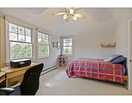 140 Cedar Street Lexington, MA 02421 - Photo 21 of 29 a living room with a bed dresser furniture and a window