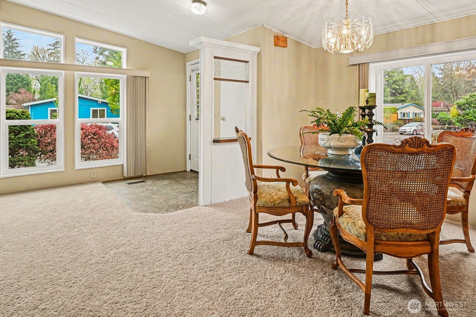 17308 Woodcrest Drive Northeast Bothell, WA 98011 - Photo 11 of 38 a view of a dining room with furniture window and outside view