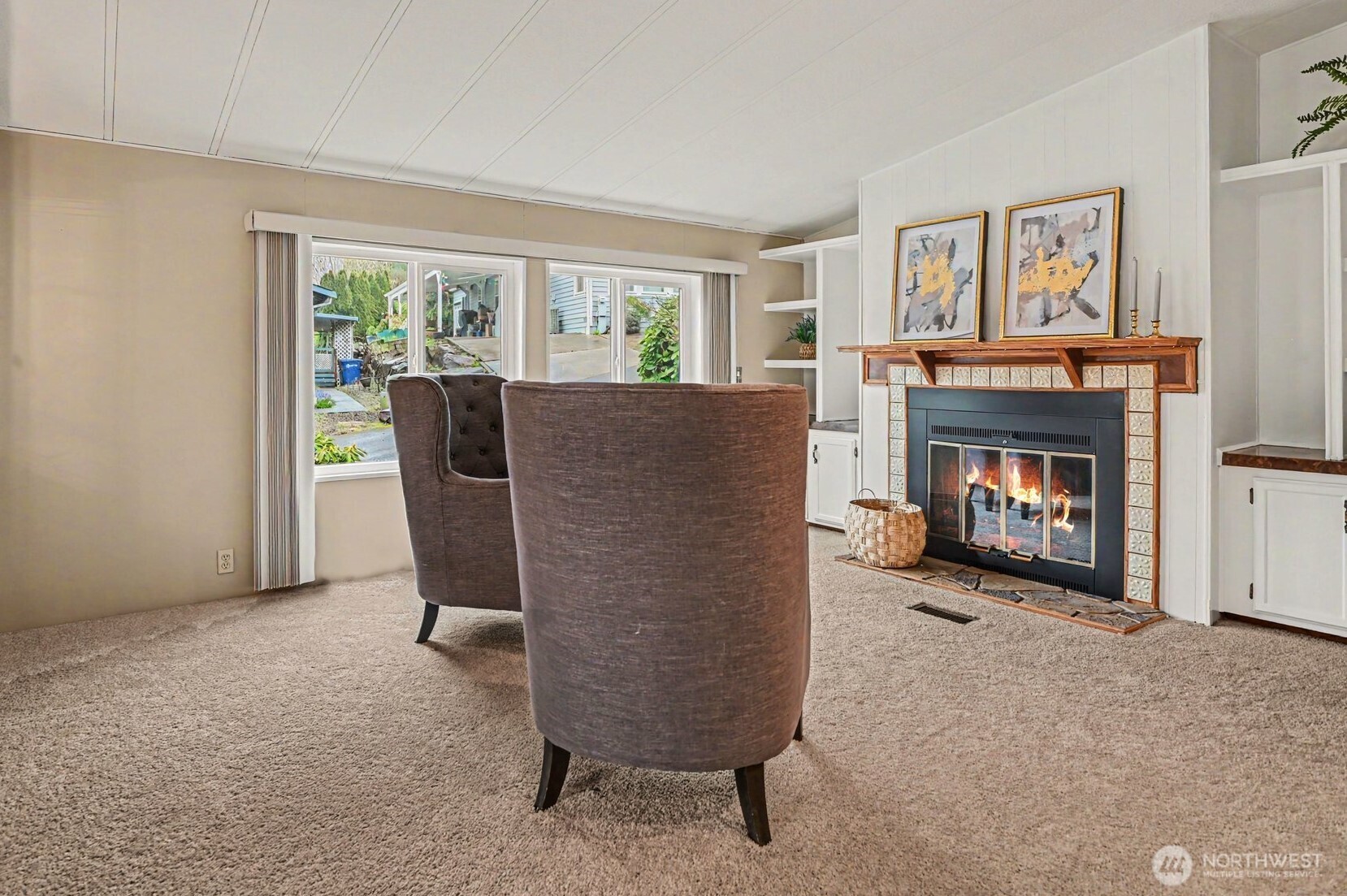17308 Woodcrest Drive Northeast Bothell, WA 98011 - Photo 20 of 38 a living room with furniture and a fireplace