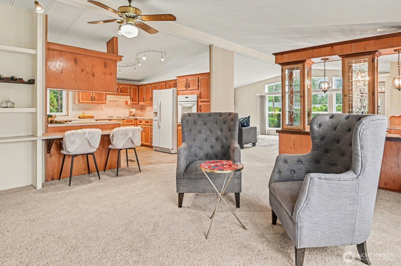 17308 Woodcrest Drive Northeast Bothell, WA 98011 - Photo 22 of 38 a living room with furniture and a large window