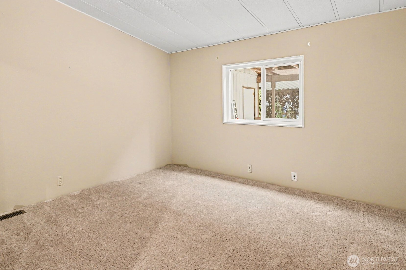 17308 Woodcrest Drive Northeast Bothell, WA 98011 - Photo 29 of 38 an empty room with windows