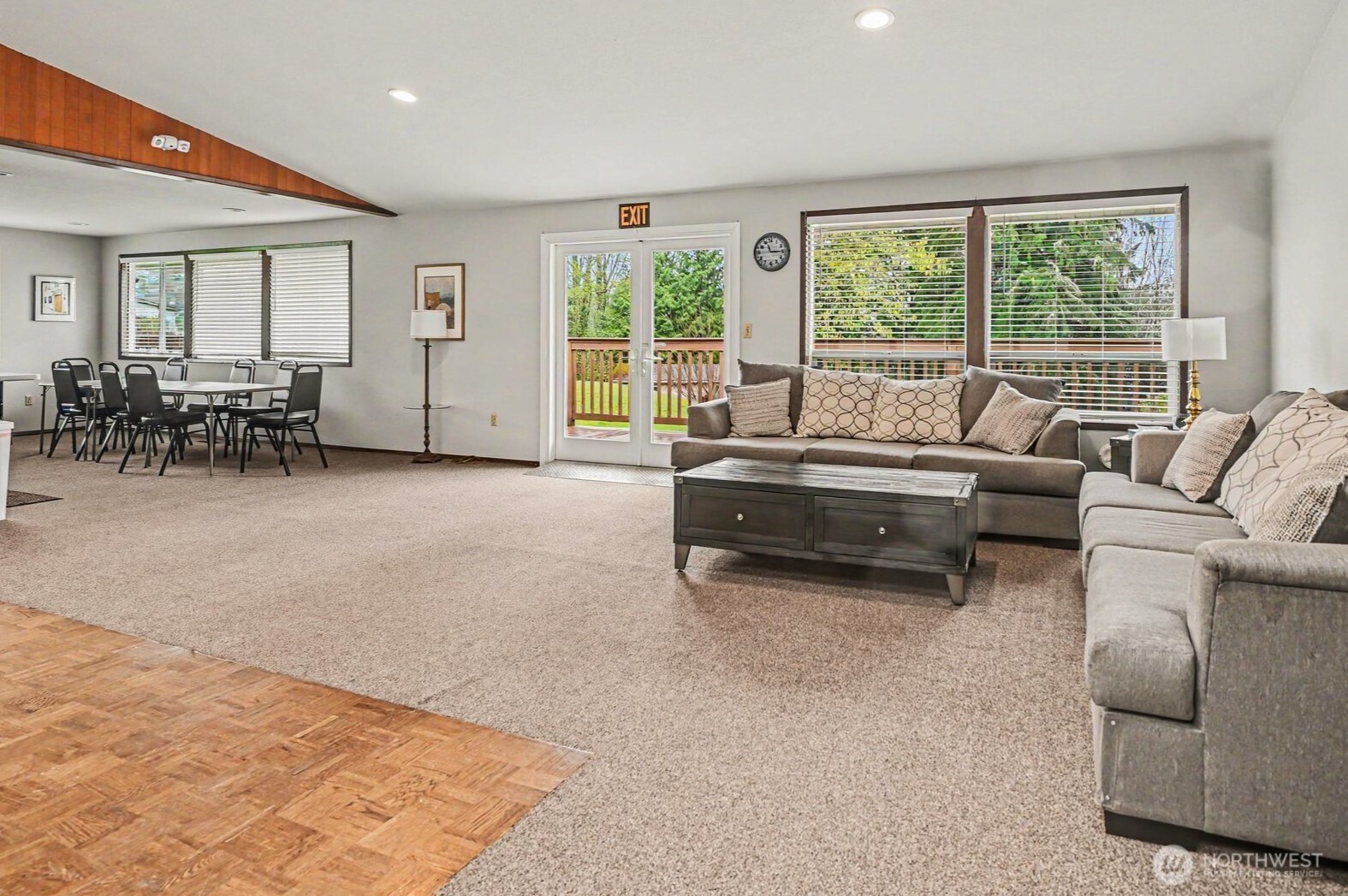 17308 Woodcrest Drive Northeast Bothell, WA 98011 - Photo 31 of 38 a living room with furniture and large windows