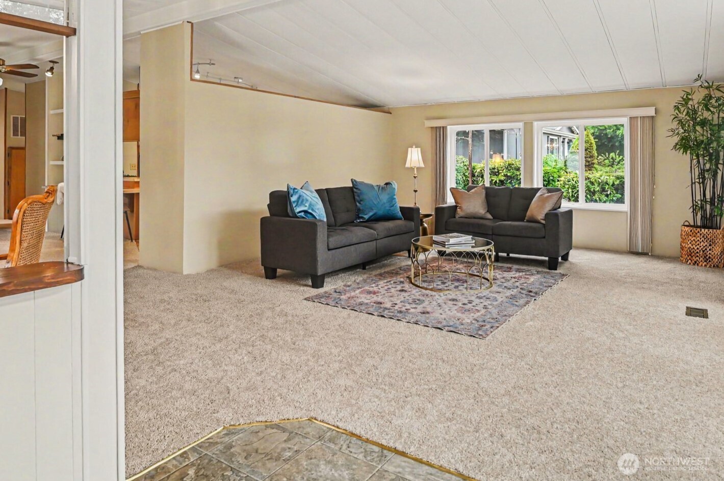 17308 Woodcrest Drive Northeast Bothell, WA 98011 - Photo 5 of 38 a living room with furniture and a large window