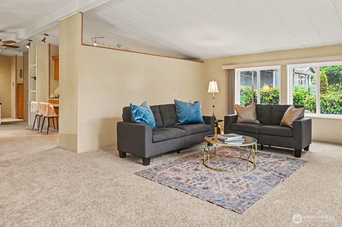 17308 Woodcrest Drive Northeast Bothell, WA 98011 - Photo 6 of 38 a living room with furniture and a large window