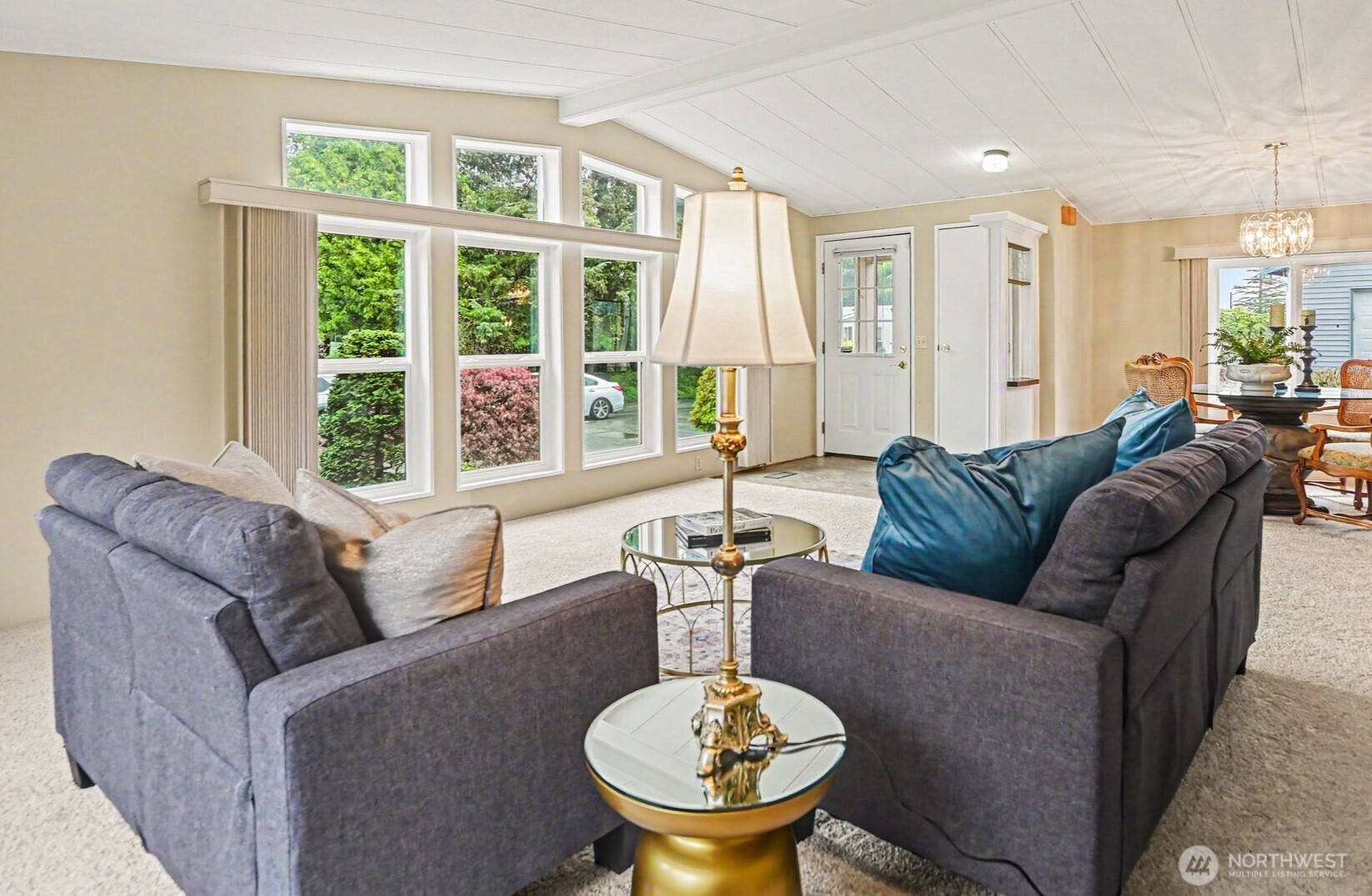 17308 Woodcrest Drive Northeast Bothell, WA 98011 - Photo 8 of 38 a living room with furniture and a large window