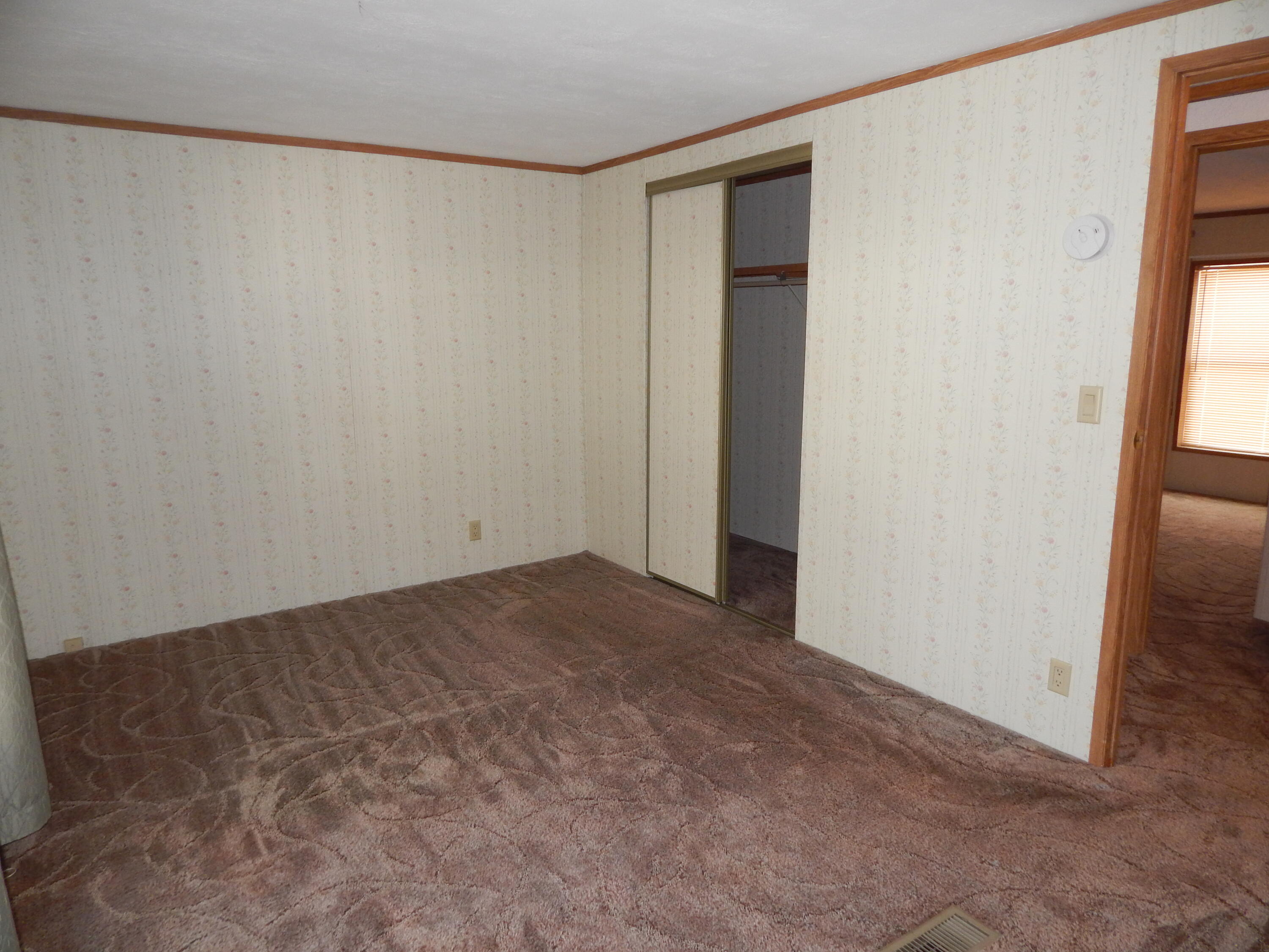 255 Colver Road, Unit 98 Talent, OR 97540 - Photo 17 of 26 Left bedroom closet