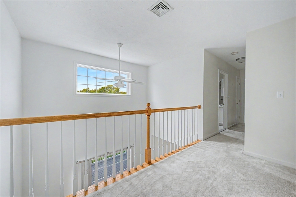 3 Oak View Terrace, Unit 3 Franklin, MA 02038 - Photo 18 of 38 a view of a hallway with a window