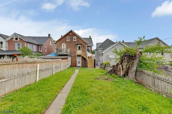 a view of a backyard with a garden