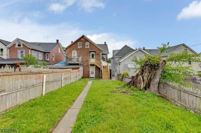 a view of a backyard with a garden