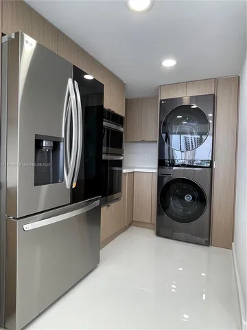 a bathroom with a toilet sink and a shower