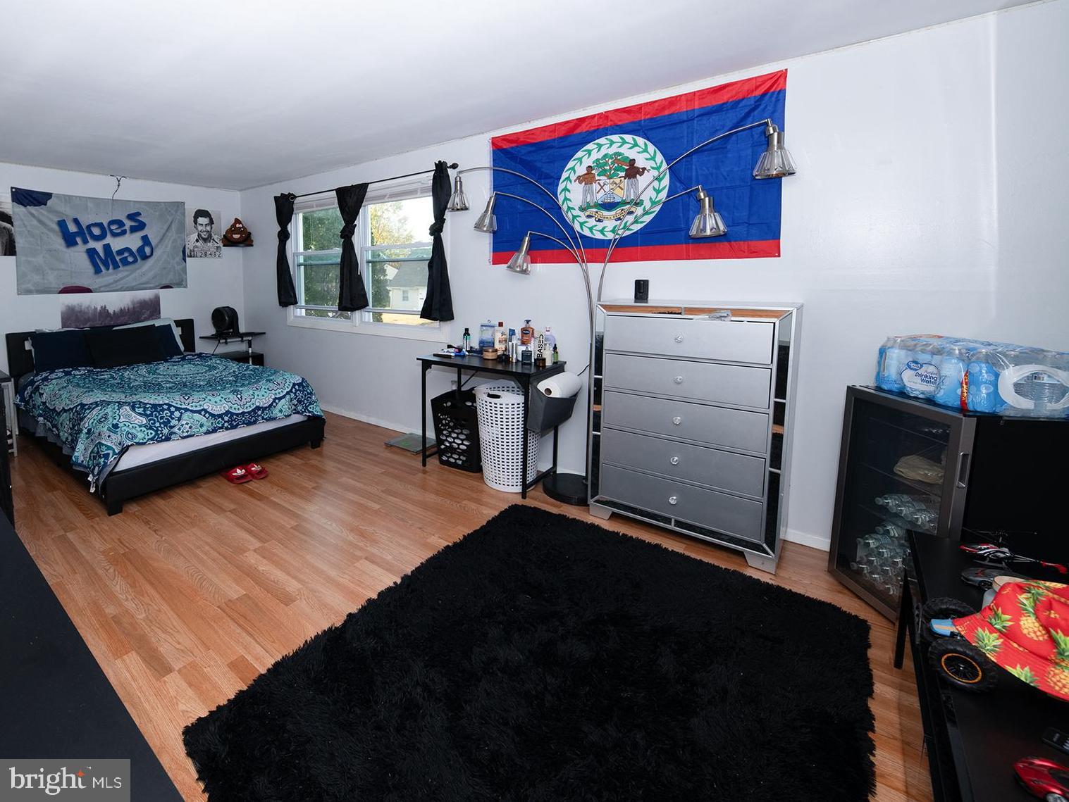 44 Middleton Lane Willingboro, NJ 08046 - Photo 15 of 18 a living room with furniture and a flat screen tv