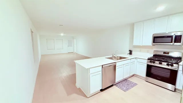 a view of a livingroom with a dishwasher