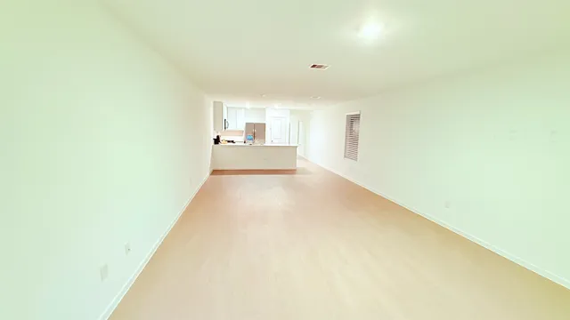 a front view of a house with a yard and porch