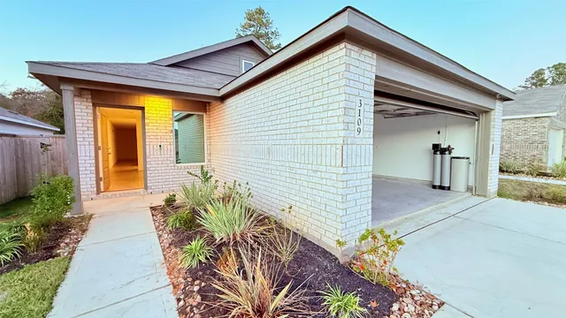 a view of a big room with windows