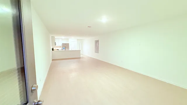 a bathroom with a shower and a toilet