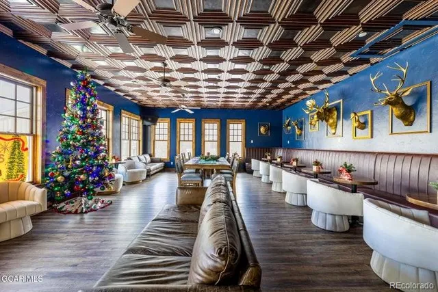 a view of a swimming pool with an outdoor seating