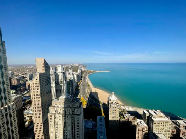 a view of a balcony with an ocean view