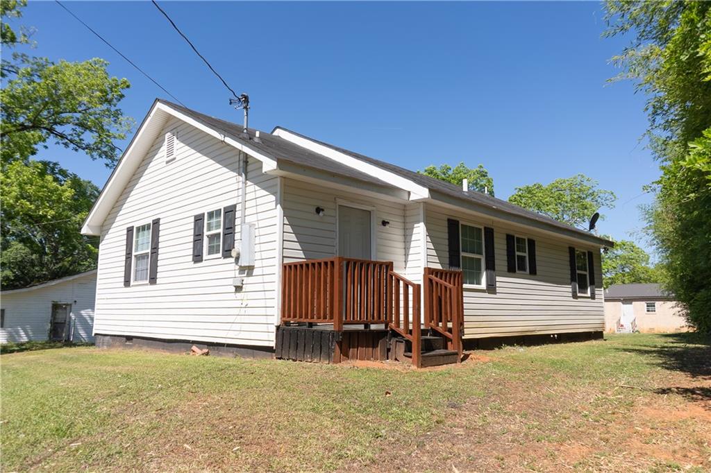53 Washington Drive Forsyth, GA 31029 - Photo 19 of 19 a view of a house with backyard