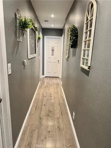 a kitchen with a stove and a refrigerator