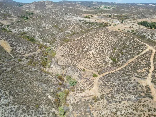 a view of a mountain range in a cloudy sky