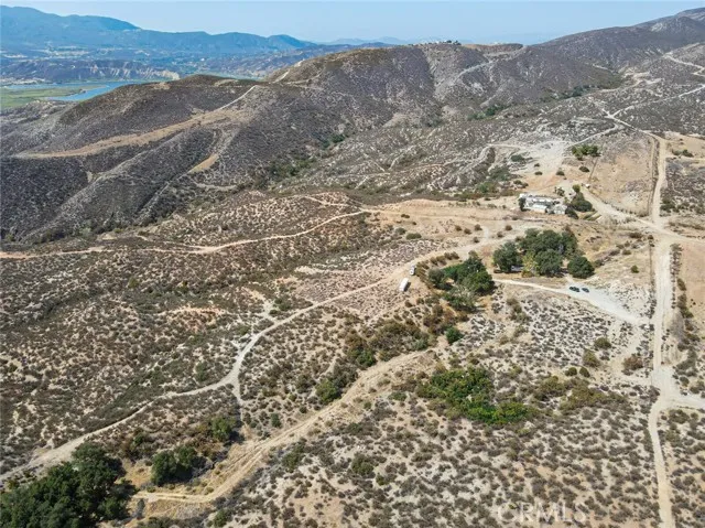 0 Exa Ely Road Temecula, CA 92592 - Photo 24 of 31 a view of a dry field with mountains in the background