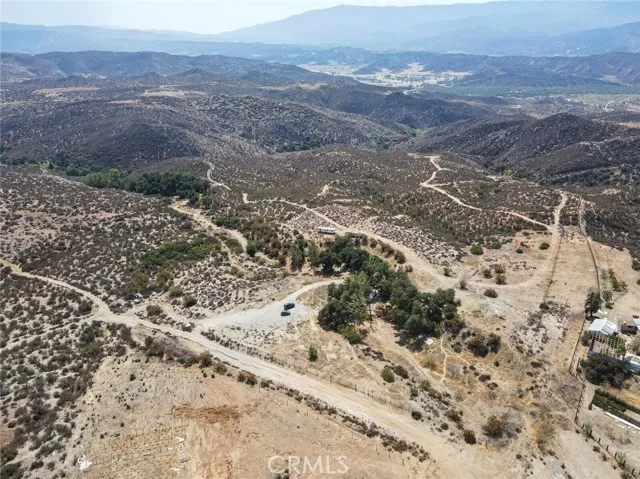 0 Exa Ely Road Temecula, CA 92592 - Photo 26 of 31 a view of a field with mountains in the background