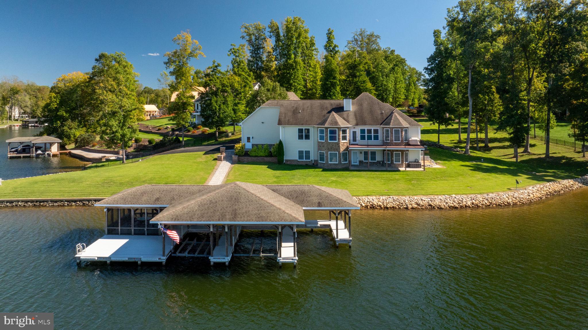 263 Lane Road Bumpass, VA 23024 - Photo 46 of 84 an aerial view of a house with swimming pool garden and outdoor seating