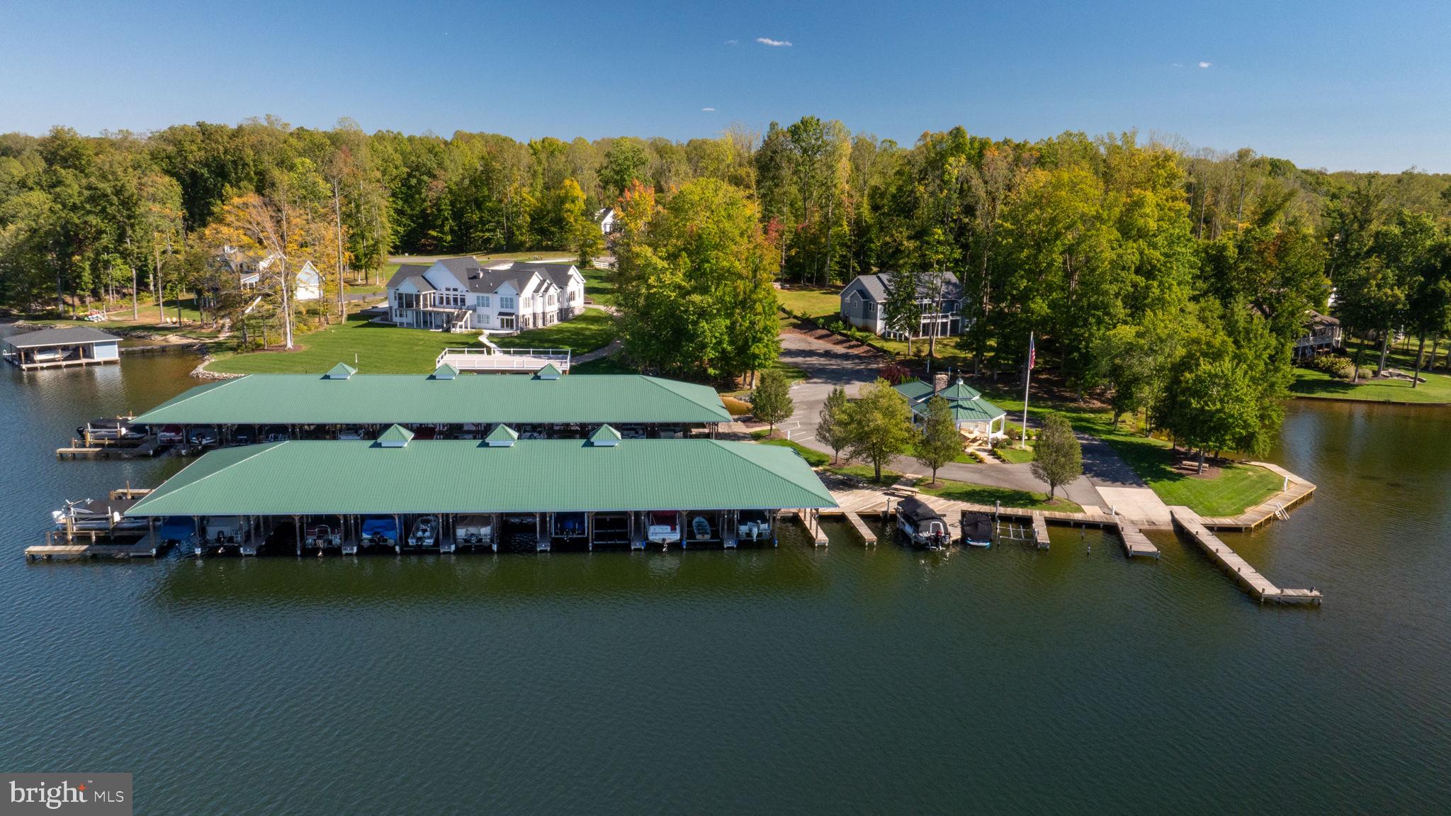 263 Lane Road Bumpass, VA 23024 - Photo 48 of 84 a view of a swimming pool with outdoor seating and city view