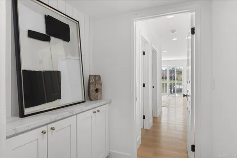 a bedroom with a large bed and a couch