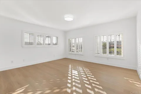 a view of house with a yard