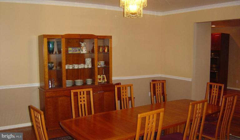 622 Church Road Reisterstown, MD 21136 - Photo 15 of 21 a view of a dining room with furniture and chandelier