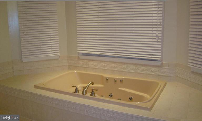 622 Church Road Reisterstown, MD 21136 - Photo 16 of 21 a white bath tub sitting next to a window