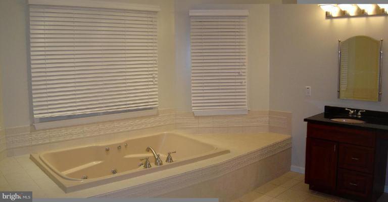 622 Church Road Reisterstown, MD 21136 - Photo 18 of 21 a bathroom with a bathtub and a sink