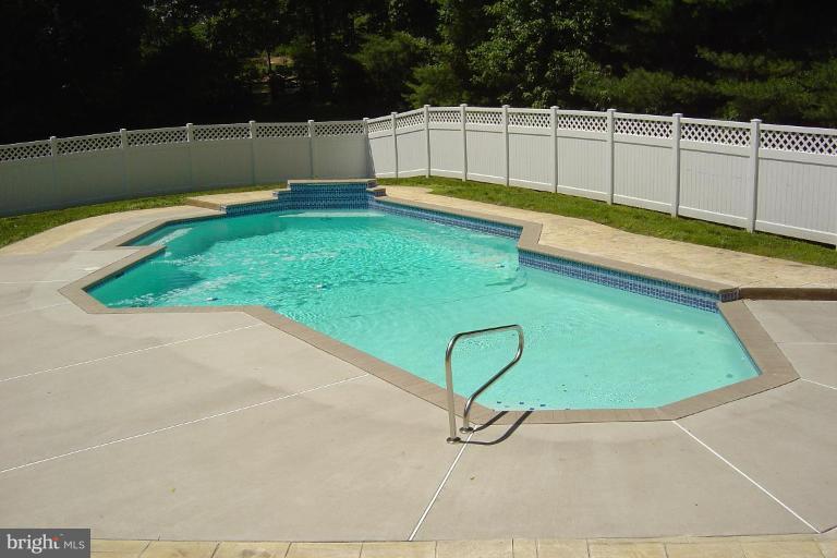 622 Church Road Reisterstown, MD 21136 - Photo 5 of 21 a view of a backyard with a small pool