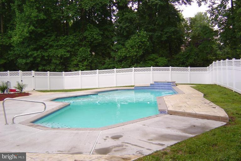 622 Church Road Reisterstown, MD 21136 - Photo 6 of 21 a view of a swimming pool with a yard