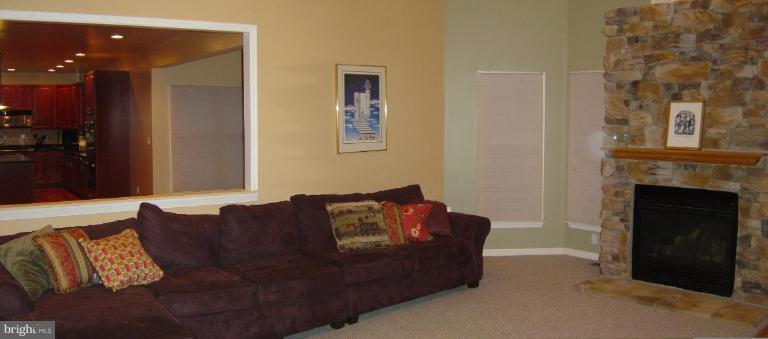622 Church Road Reisterstown, MD 21136 - Photo 7 of 21 a living room with furniture and a fireplace