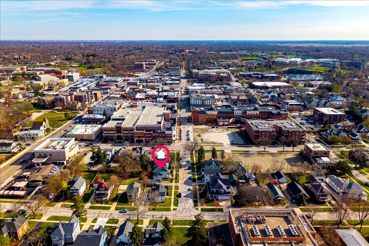 18 North Main Street Naperville, IL 60540 - Photo 2 of 32 an aerial view of a city