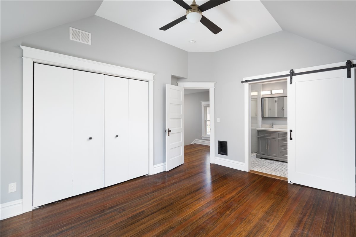 18 North Main Street Naperville, IL 60540 - Photo 22 of 32 a view of an empty room with wooden floor
