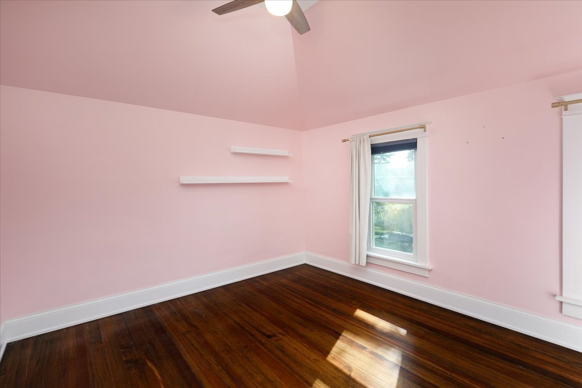 18 North Main Street Naperville, IL 60540 - Photo 24 of 32 a view of empty room with wooden floor and fan