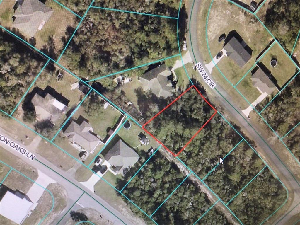 0 Southwest 24th Circle Ocala, FL 34472 - Photo 2 of 4 an aerial view of residential house with outdoor space