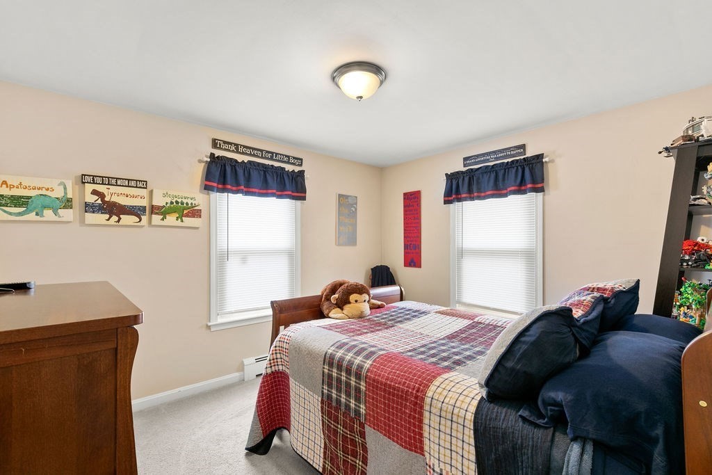 11 Fuller Road Attleboro, MA 02703 - Photo 11 of 21 a bedroom with a bed and a window