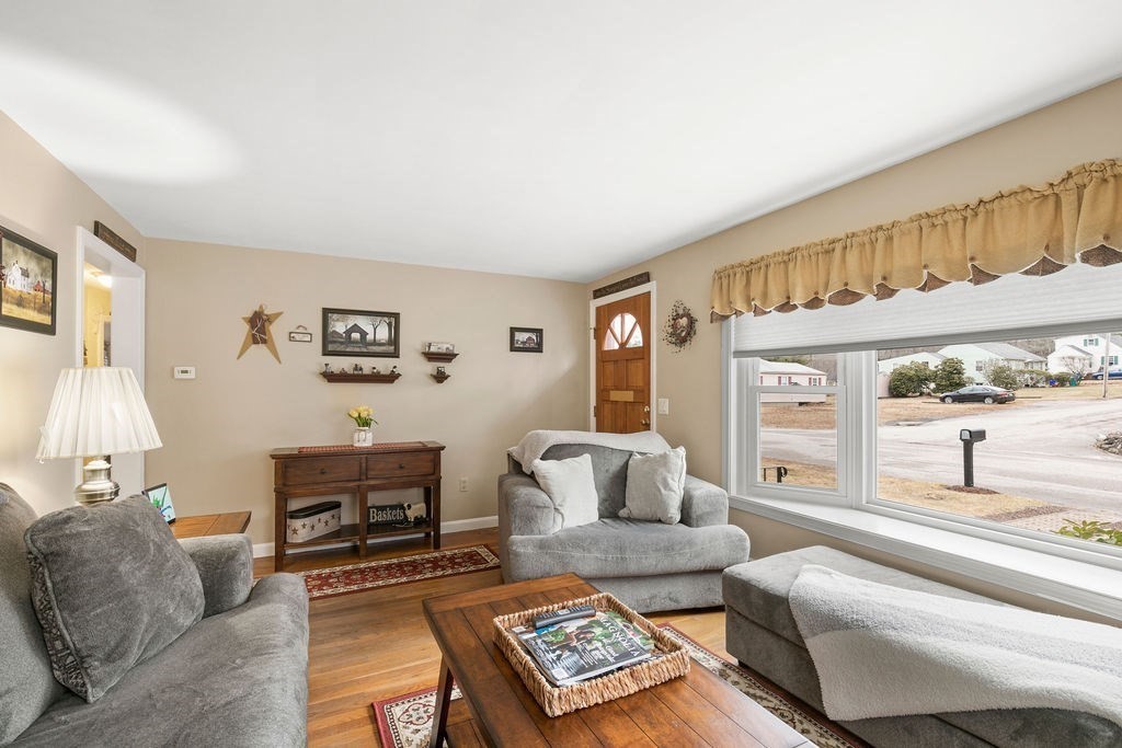 11 Fuller Road Attleboro, MA 02703 - Photo 16 of 21 a living room with furniture and a large window