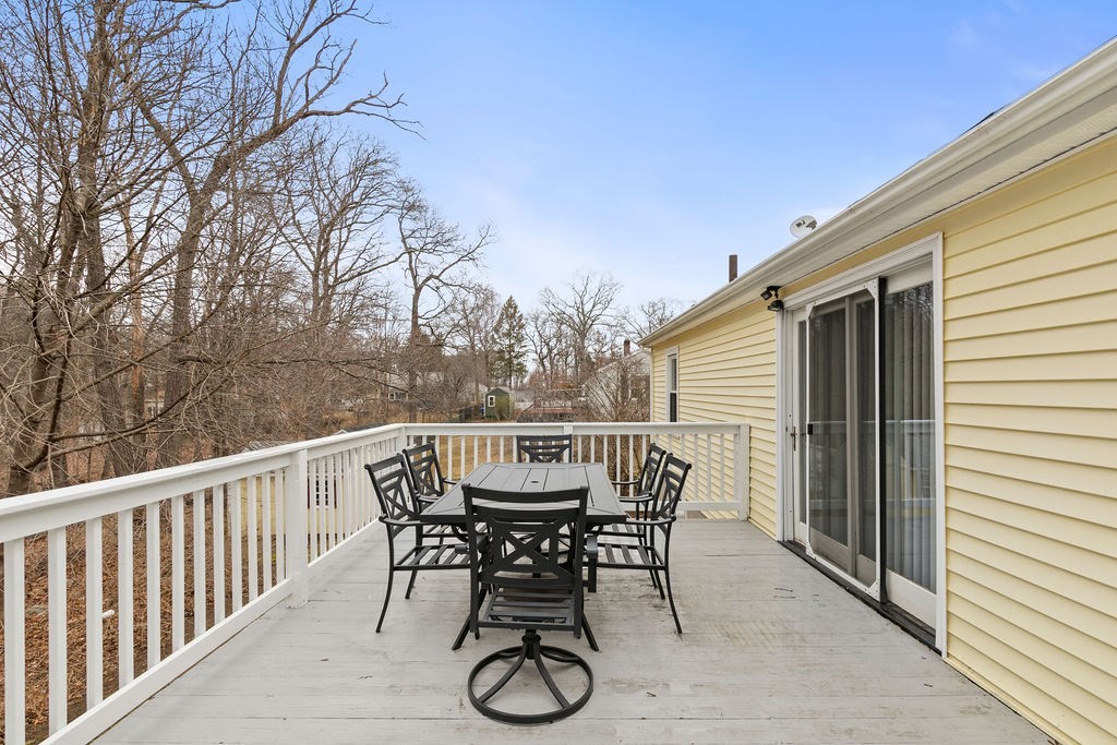 11 Fuller Road Attleboro, MA 02703 - Photo 17 of 21 a view of a table and chair in the balcony