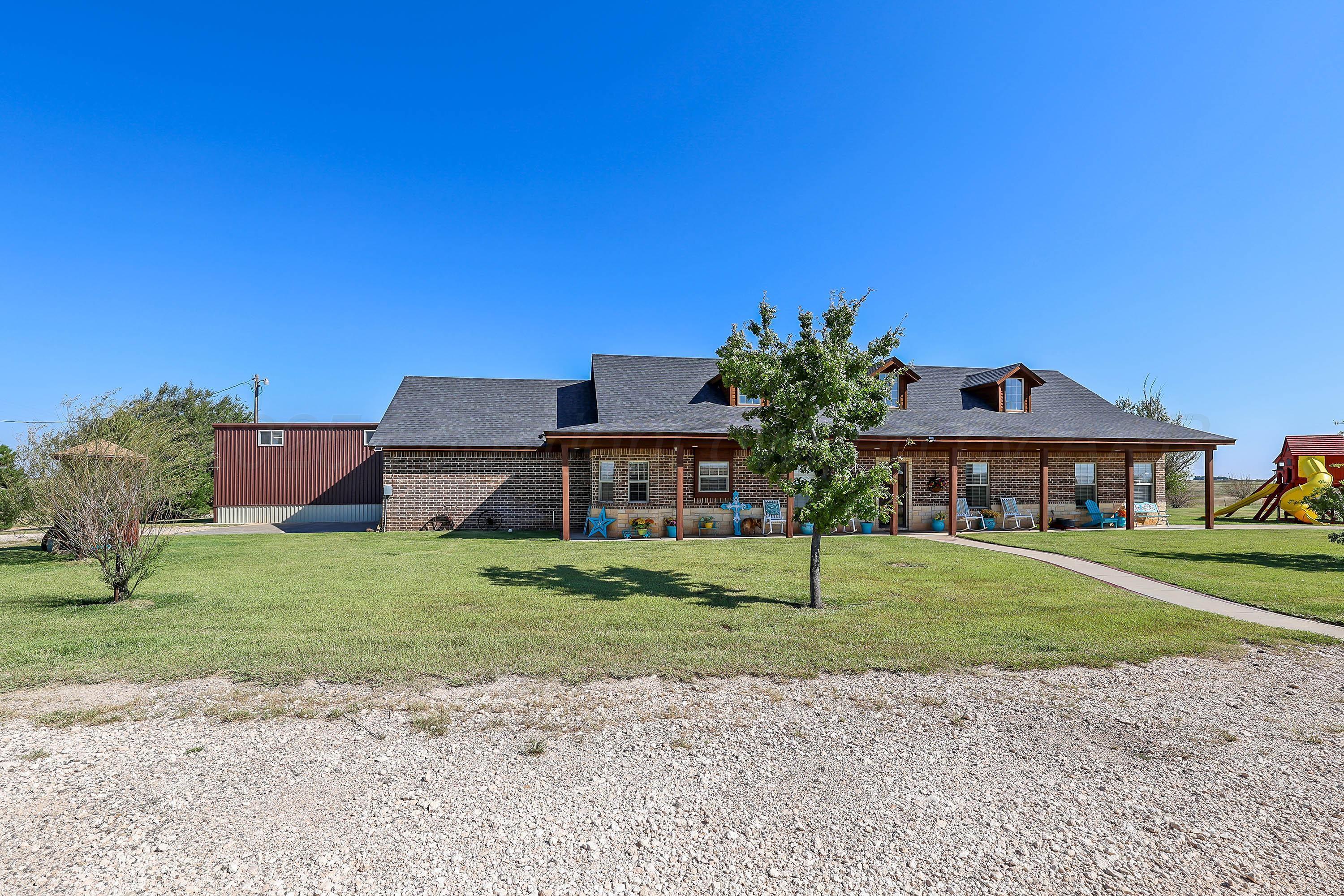 a house view with a garden space